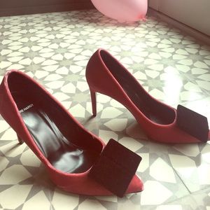 Pierre Hardy velvet fuchsia pumps.
